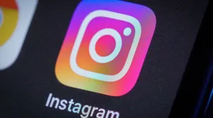 A person looking at an Instagram profile that is no longer accessible.